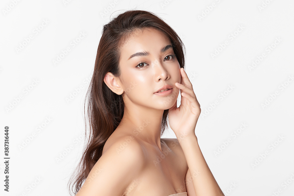 Beautiful young asian woman with clean fresh skin on white background, Face care, Facial treatment, Cosmetology, beauty and spa, Asian women portrait Beautiful young asian woman with clean fresh skin on white background, Face care, Facial treatment, Cosmetology, beauty and spa, Asian women portrait