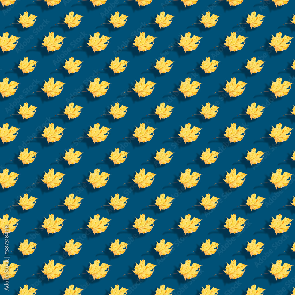 Isometric Autumn leaves pattern on colored background. Seamless pattern.