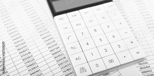 Calculator with Financial accounting graphs. Finance, business and accounting concept.