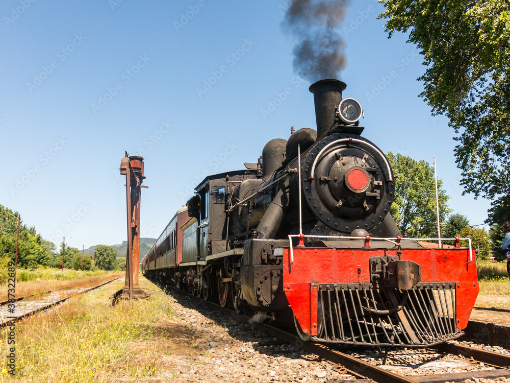 Fototapeta premium Tourist train called Valdiviano that runs from Valdivia to Antilhue with a 1913 North British locomotive type 57. Los Rios Region, in southern Chile.