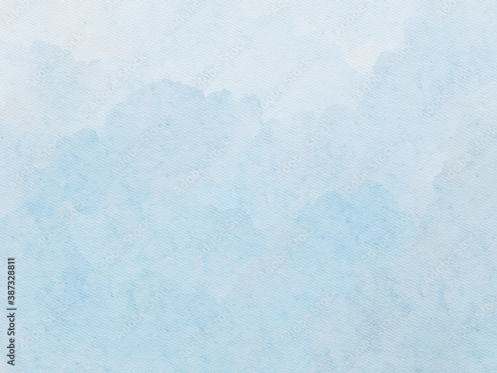 Hand painted subtle blue watercolor background with paper texture