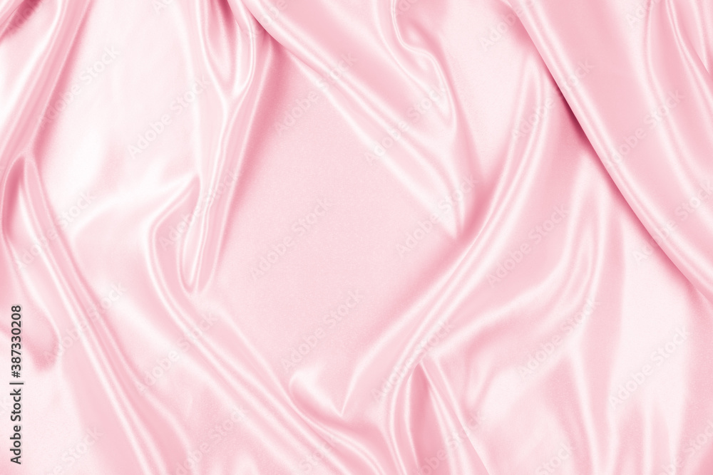 Beautiful elegant wavy light pink satin silk luxury cloth fabric texture, abstract background design. Copy space Beautiful elegant wavy light pink satin silk luxury cloth fabric texture, abstract background design. Copy space