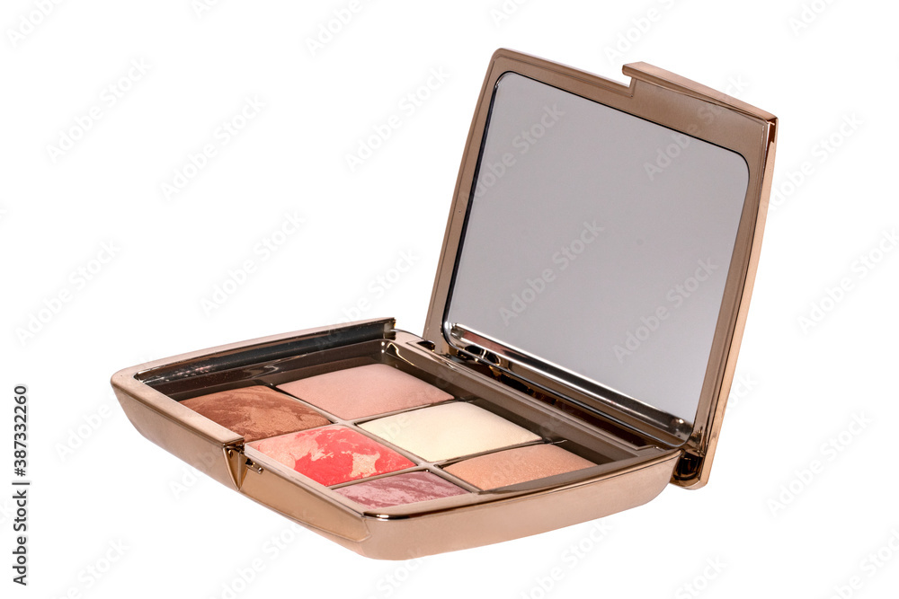 Cosmetic products isolated. Close-up of a elegant opened box with various cheek or face powder in it isolated on a white background. Blusher and bronzer. Make-up concept. Cosmetic products isolated. Close-up of a elegant opened box with various cheek or face powder in it isolated on a white background. Blusher and bronzer. Make-up concept.