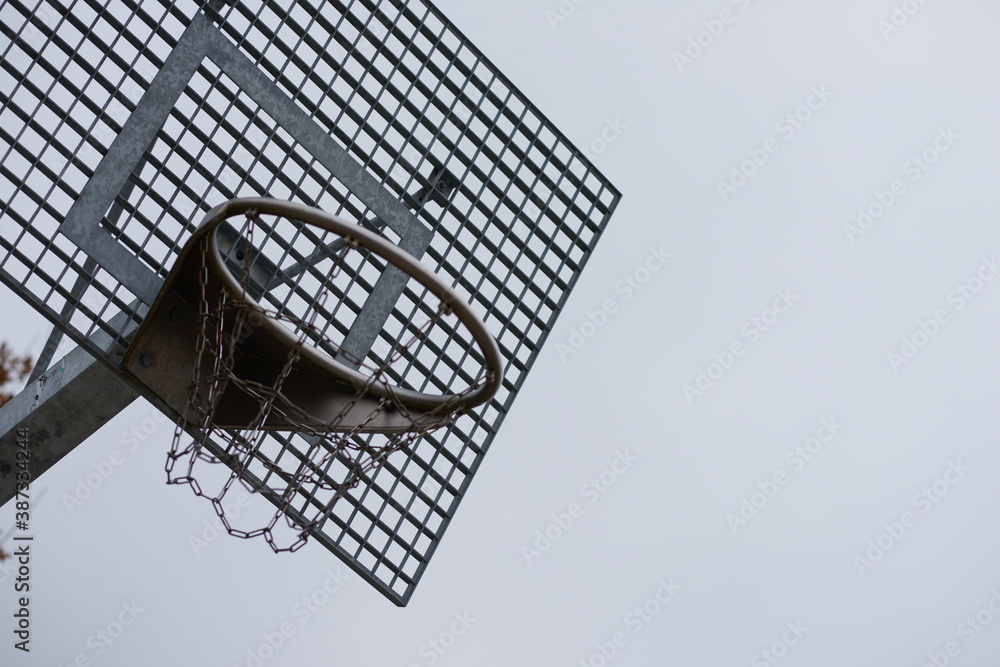 Closeup of a metal and rustic basketball hoop Closeup of a metal and rustic basketball hoop
