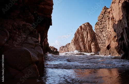 Cliffs and rocks on the Atlantic ocean coast - Praia da Ursa beach, Portugal.