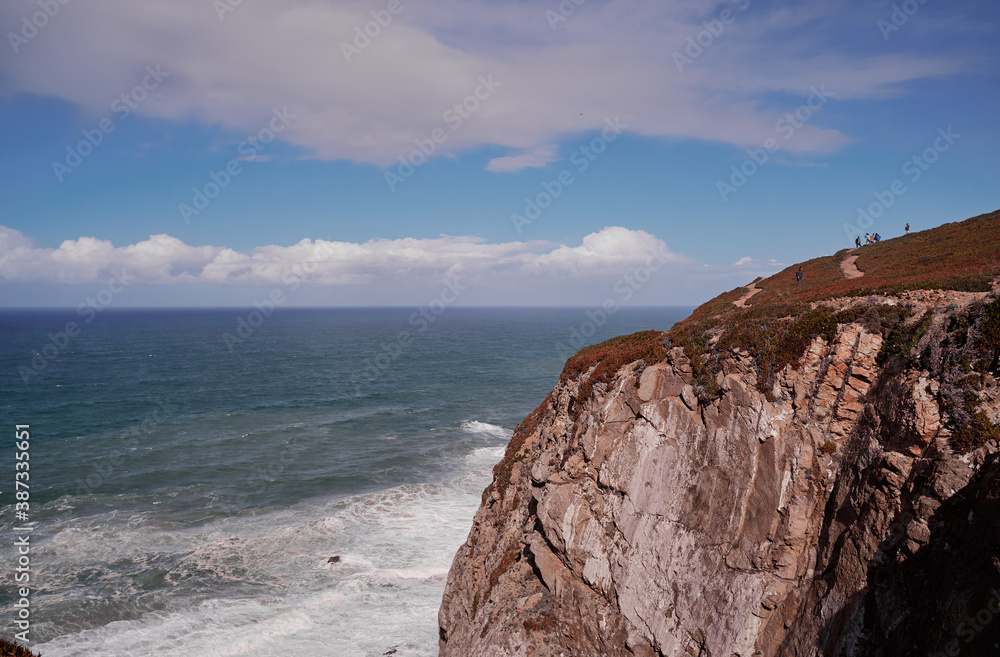 Rocks and waves at coastline picturesque landscape. Cabo da Roca, Portugal.