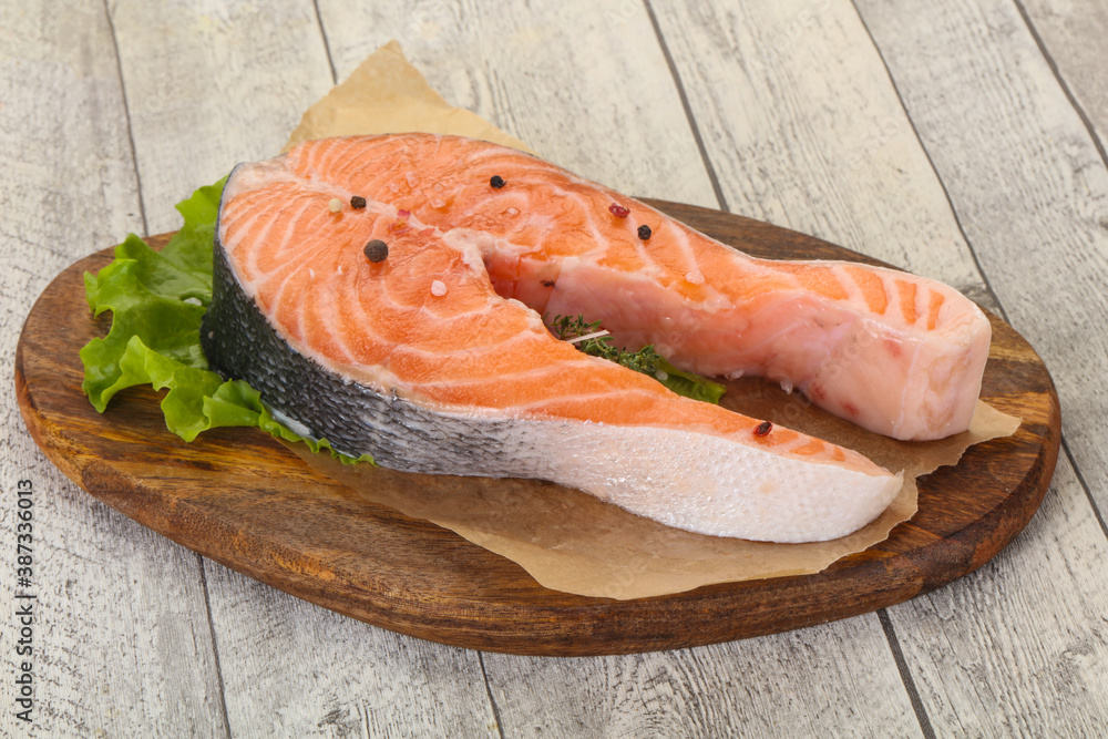 Raw salmon steak - ready for grill Raw salmon steak - ready for grill