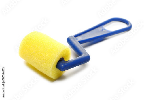 New clean sponge roller for home renovation isolated on white background