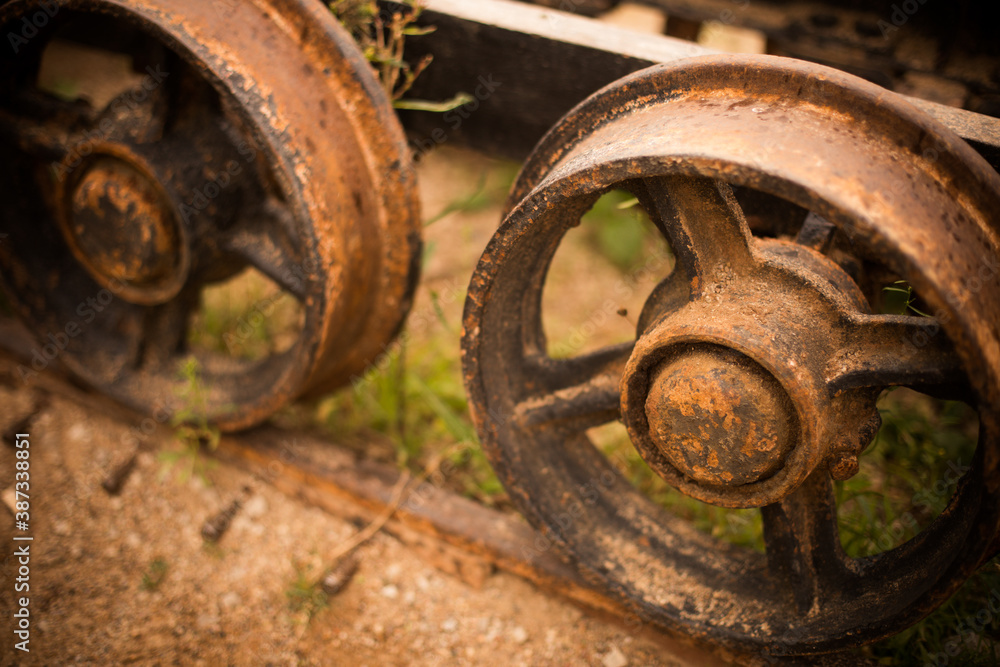 Metal wheels of an abandoned wagon Metal wheels of an abandoned wagon