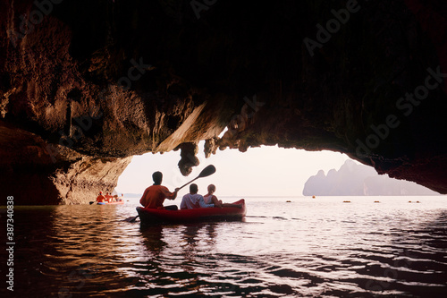 Tourist are visiting by flatwater canoeing. Located in Ao Phang Nga National Park, Phuket, Thailand. photo