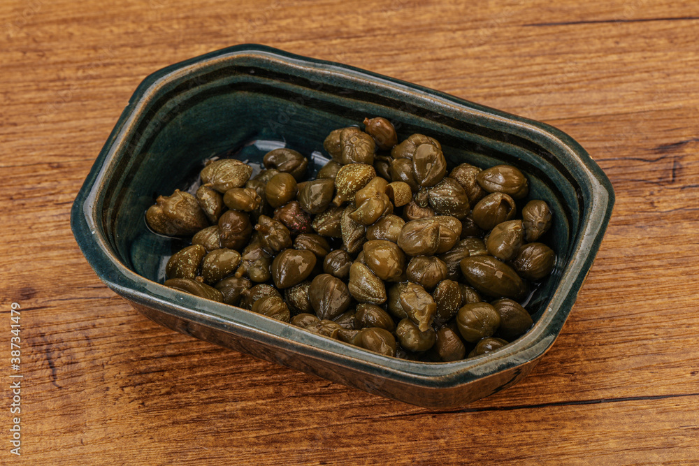 Tasty capers in the bowl Tasty capers in the bowl