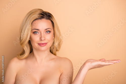 Slika na platnu Close up photo of beautiful lady advising salon procedure holding arm air naked