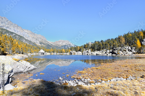 The Serva lake, a splendid alpine lake, in the natural park of Monte Avic in the Aosta valley