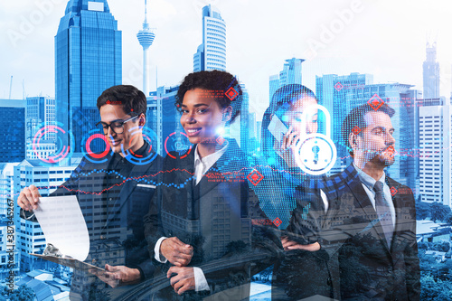 Photography Group of business colleagues as a part of multinational corporate team working on project to protect clients information at cybersecurity compliance division