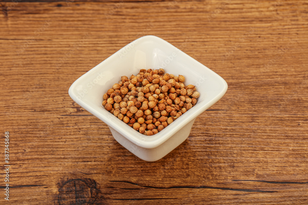 Coriander seeds in the bowl Coriander seeds in the bowl