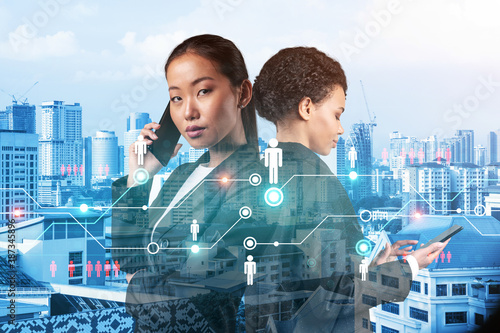 Canvas Print Two young astonishing SMM specialists working on social media marketing strategy to achieve business goals
