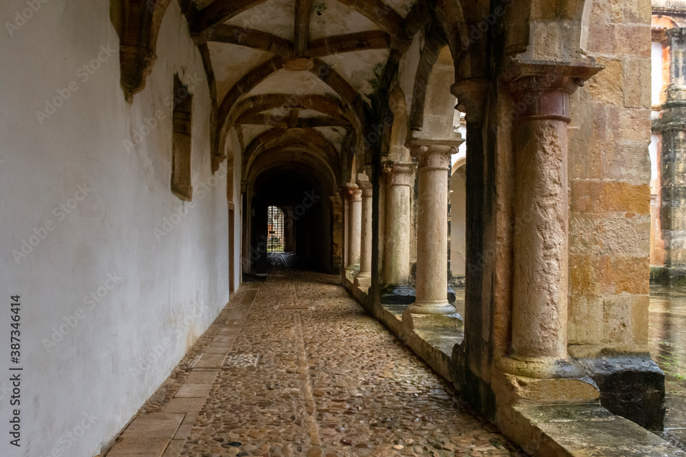 Cloister Stone Walkway, With Columns And Vaulted Ceiling. Tomar, Portugal 