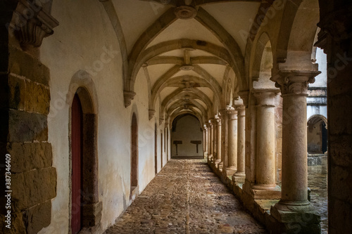 Cloister Stone Walkway  With Columns And Vaulted Ceiling. Tomar  Portugal 