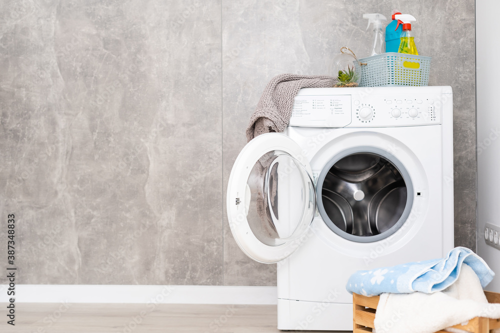 Contemporary luxury laundry in a brand new apartment in white. Contemporary luxury laundry in a brand new apartment in white.