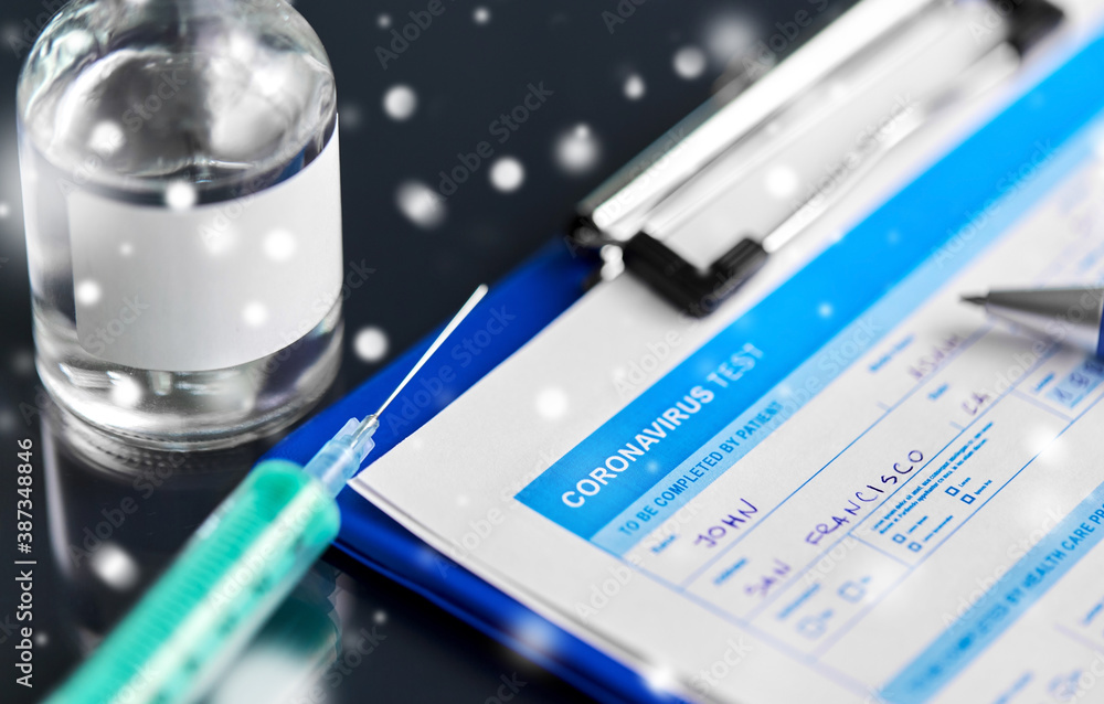 medicine and healthcare concept - close up of clipboard with medical report, pen, syringe and drug on table in winter over snow medicine and healthcare concept - close up of clipboard with medical report, pen, syringe and drug on table in winter over snow