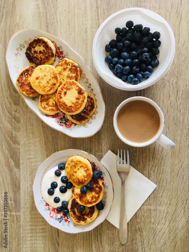 Сheesecakes with blueberries for breakfast Сheesecakes with blueberries for breakfast