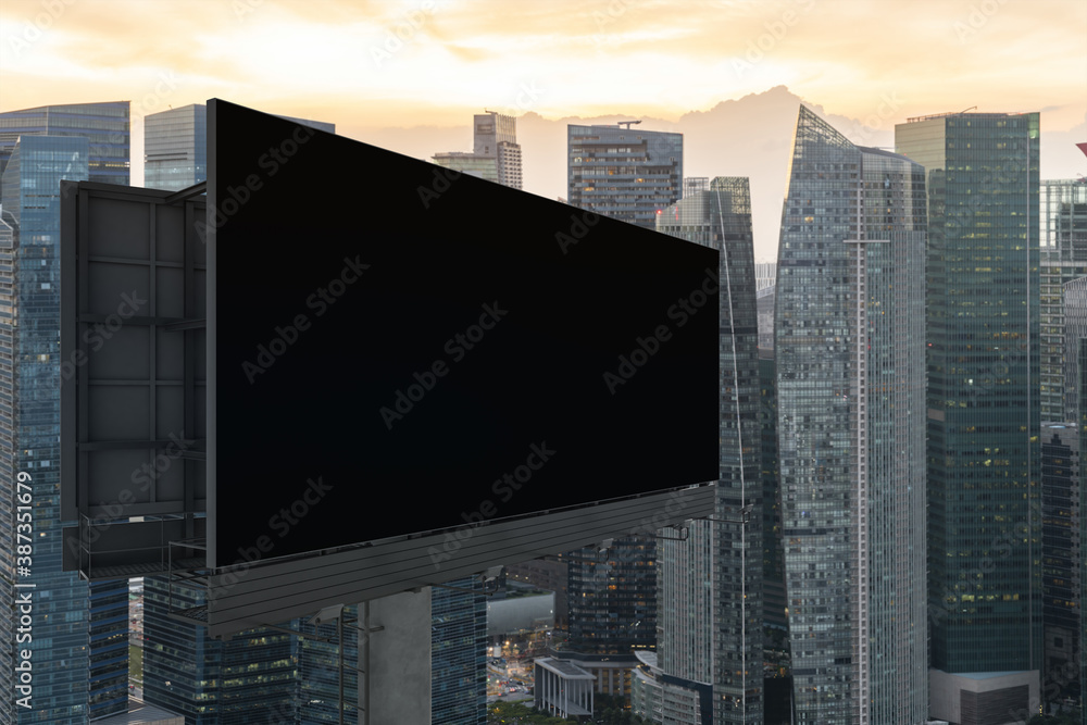 Blank black road billboard with Singapore cityscape background at sunset. Street advertising poster, mock up, 3D rendering. Side view. The concept of marketing communication to sell idea. Blank black road billboard with Singapore cityscape background at sunset. Street advertising poster, mock up, 3D rendering. Side view. The concept of marketing communication to sell idea.