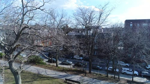 View of Trees in an Urban Park - Crane Shot photo