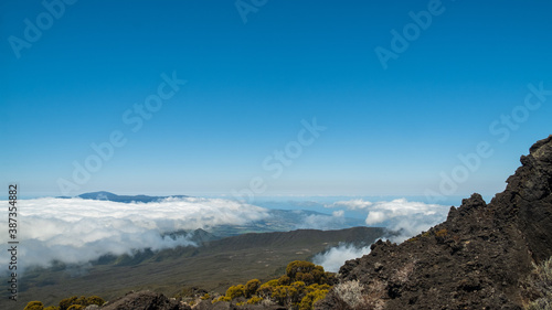 Panoramic view over the mountains with a sea of fog © Gnac49