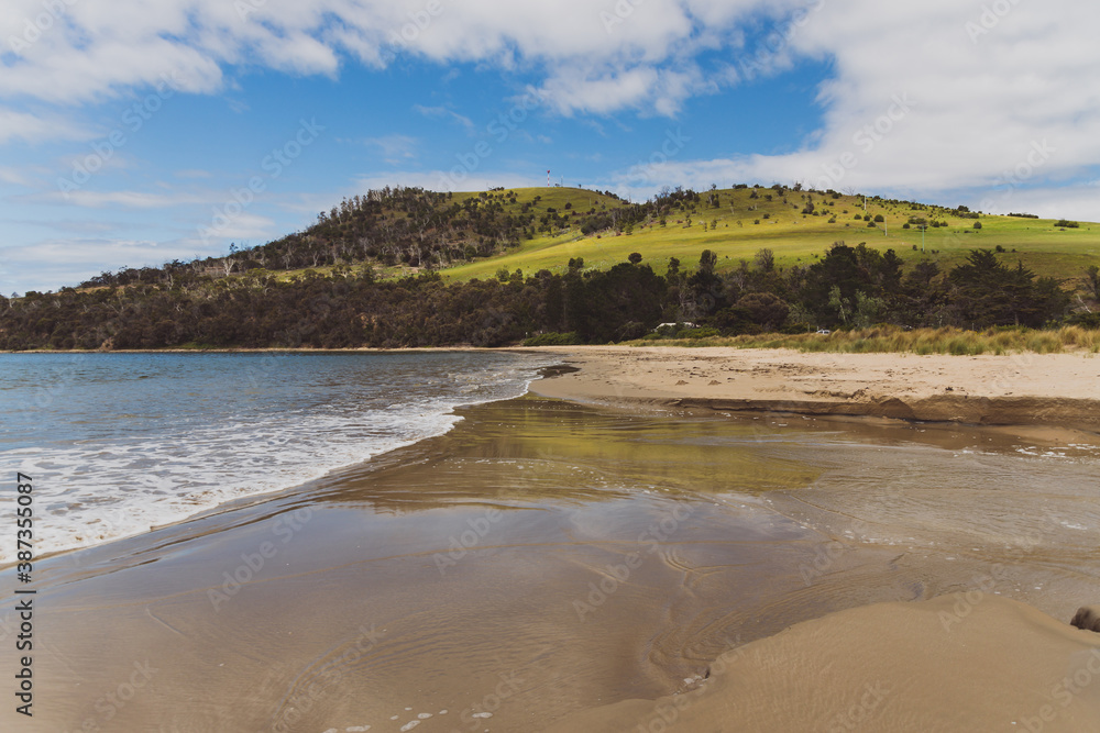 Seven Mile beach a pristine golden sand beach just outside of the city of Hobart in Tasmania, Australia Seven Mile beach a pristine golden sand beach just outside of the city of Hobart in Tasmania, Australia