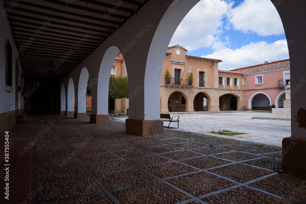 Town council of Masegoso de Tajuña through the arches of the portico, Guadalajara, Spain