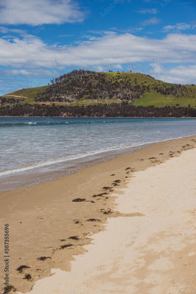 Seven Mile beach a pristine golden sand beach just outside of the city of Hobart in Tasmania, Australia Seven Mile beach a pristine golden sand beach just outside of the city of Hobart in Tasmania, Australia