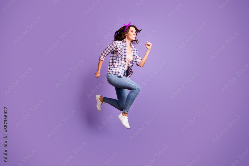 Profile photo portrait of cute pretty brown hair woman wear vintage checkered shirt jumping high isolated violet color background