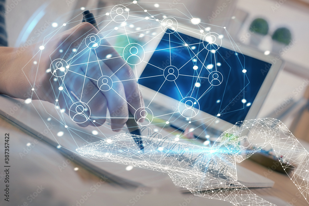 Social network theme hologram over woman's hands writing background. Concept of international people connect. Double exposure Social network theme hologram over woman's hands writing background. Concept of international people connect. Double exposure