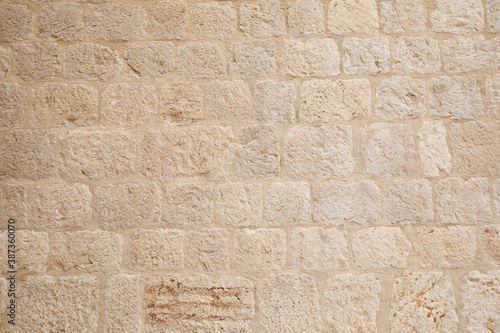 Vintage white stone wall texture.