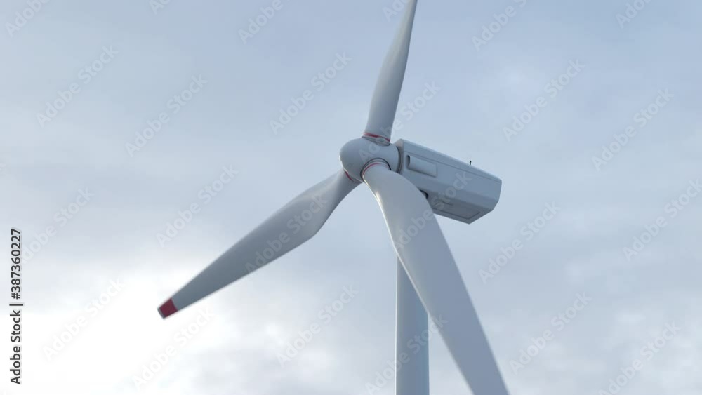 Close-up of large wind turbine in full operation. Close-up of large wind turbine in full operation.