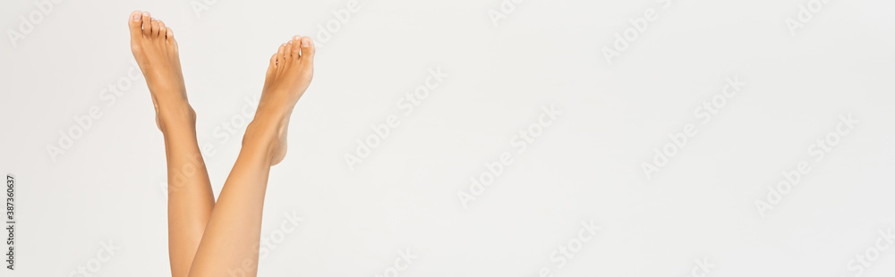 Woman with smooth legs in air isolated on white background, banner Woman with smooth legs in air isolated on white background, banner
