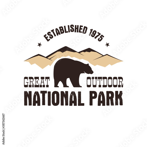 National park retro style badge. Mountain explorer label. Outdoor adventure logo with bear. Travel and hipster insignia. Wilderness, forest camping emblem Hiking. design typography.