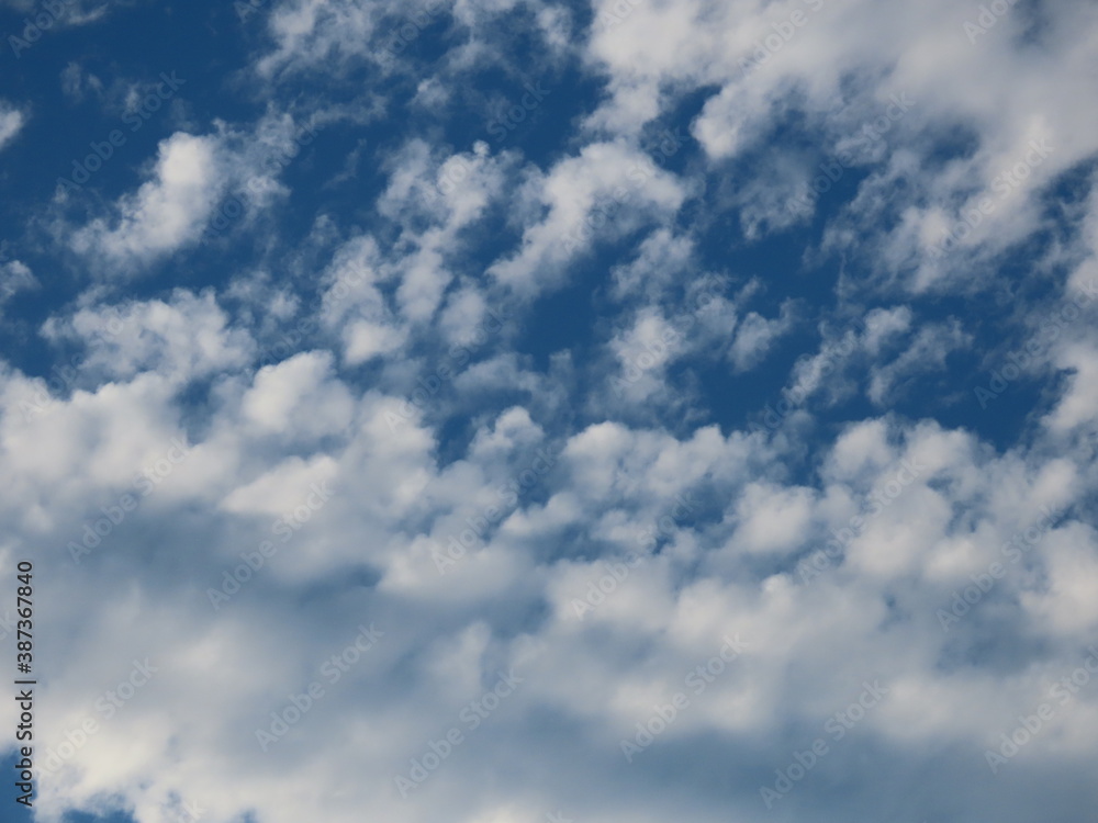 Beautiful background of blue sky and white clouds in autumn in Israel close-up. Beautiful background of blue sky and white clouds in autumn in Israel close-up.