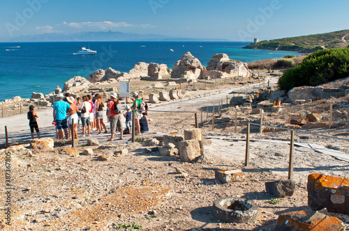 Tharros, Archeological area, Punic and Roman ruins and blue sea in Sardinia photo