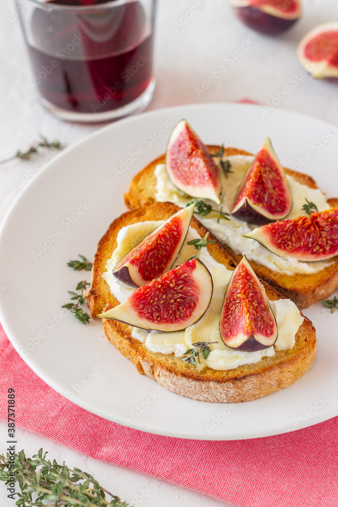 Bruschetta with figs, honey and cheese. Healthy eating. Vegetarian food. Bruschetta with figs, honey and cheese. Healthy eating. Vegetarian food.