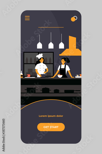 Popular cooking show concept. Camera man and stage manager shooting smiling chefs cooking and talking at kitchen counter. For TV show production, television, coking contest topics