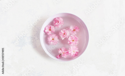 Ceramic bowl with water and flowers 