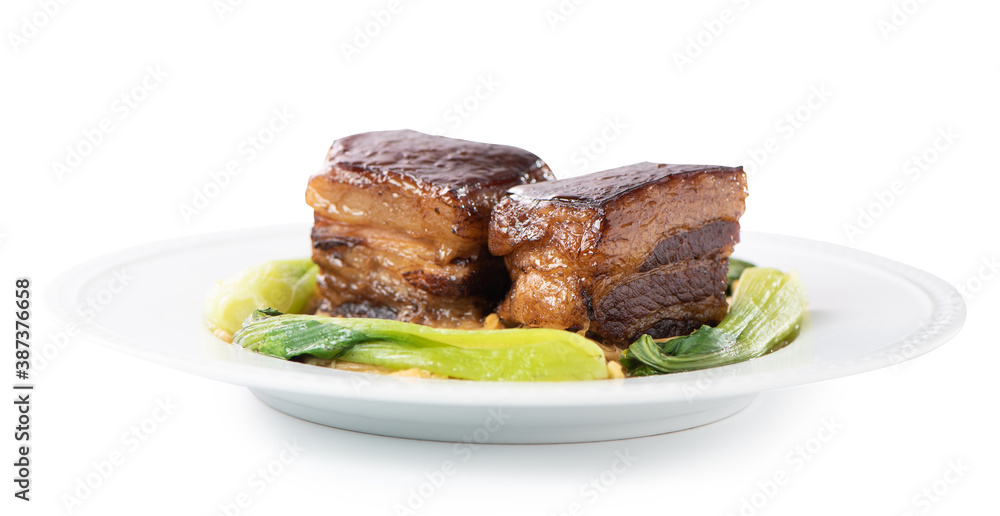 Isolated Dong Po Rou (Dongpo pork meat) in a beautiful plate with green vegetable. Isolated Dong Po Rou (Dongpo pork meat) in a beautiful plate with green vegetable.