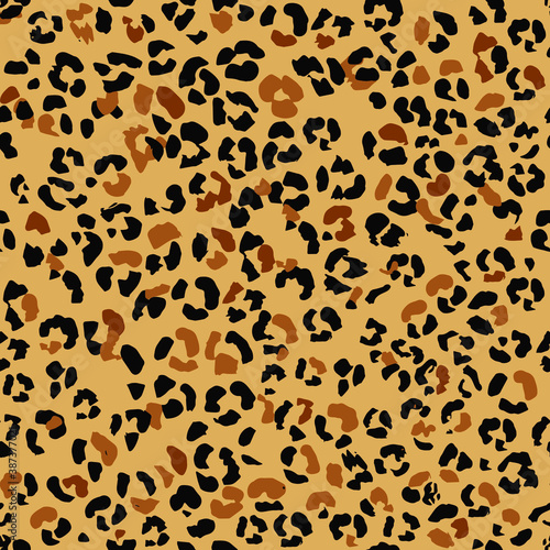 Abstract seamless leopard skin pattern. Jaguar, leopard, Cheetah, Panther. Seamless camouflage background. On a beige background.