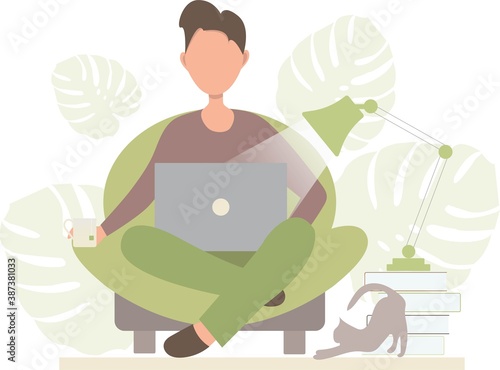 Man with laptop sitting home and working remotely from home. Freelancer. Working from home. Studying from home.