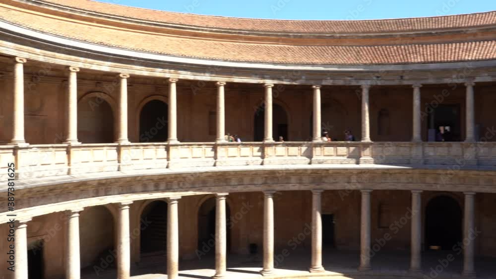 Panoramic View Of Ancient Palace Of Carlos V, A Renaissance Building In Granada, Spain Inside The Nasrid Fortification Of The Alhambra - panning shot Panoramic View Of Ancient Palace Of Carlos V, A Renaissance Building In Granada, Spain Inside The Nasrid Fortification Of The Alhambra - panning shot