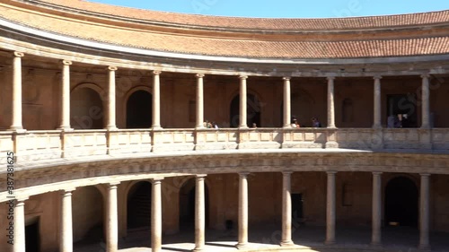 Panoramic View Of Ancient Palace Of Carlos V, A Renaissance Building In Granada, Spain Inside The Nasrid Fortification Of The Alhambra - panning shot photo