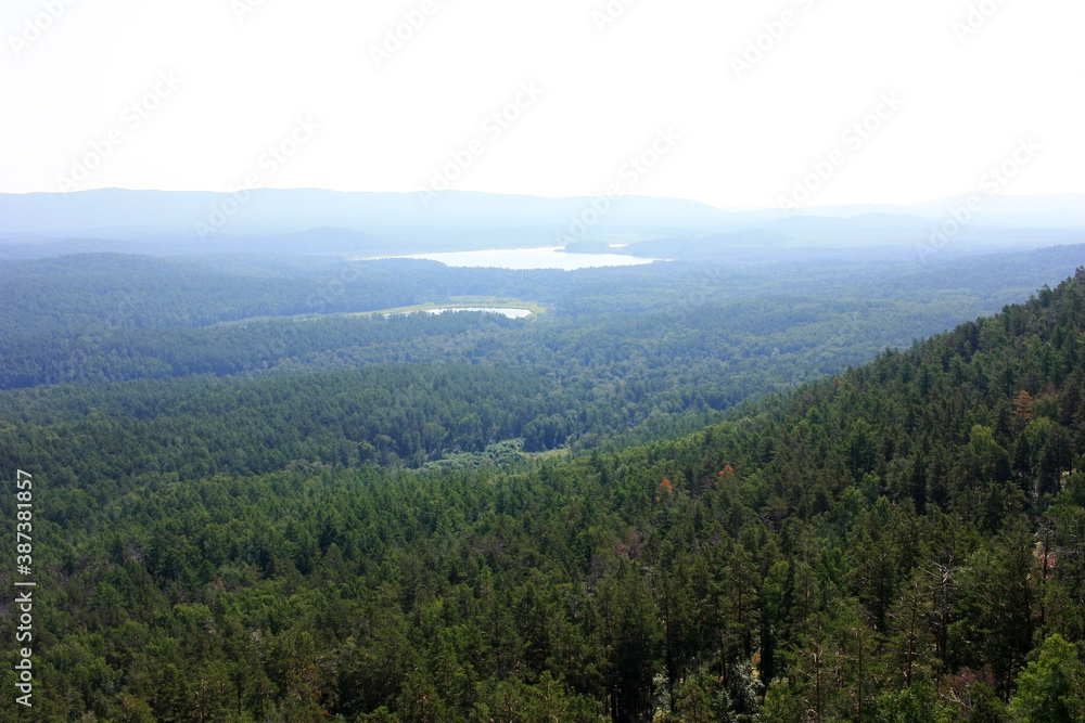 View of Lake Arakul from the height of the stone ridge