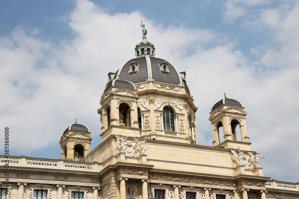 Dome with a statue on a building in Vienna AUstria