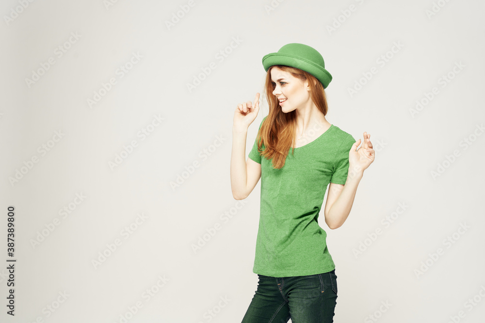 Holidays St. Patrick's Day pretty woman with shamrock on her hand